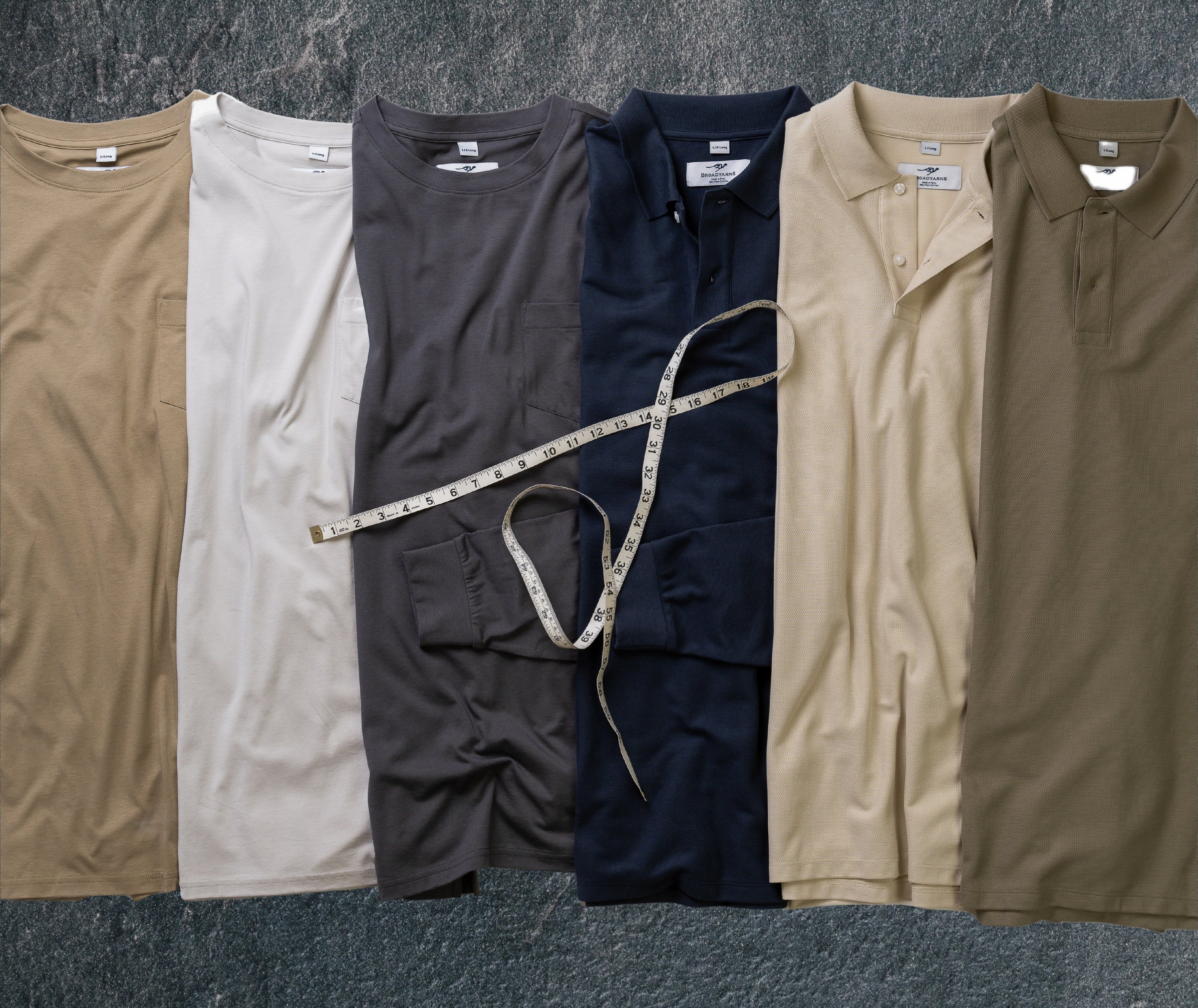 flatlay of long-sleeve polos and t-shirts